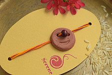 Terracotta ❂ Handmade . Rakhi { f }